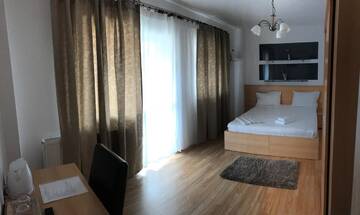 Фото номера Апартаменты с 2 спальнями Отель Hotel Nova Bital г. Popeşti-Leordeni 6