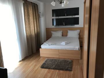 Фото номера Апартаменты с 2 спальнями Отель Hotel Nova Bital г. Popeşti-Leordeni 4