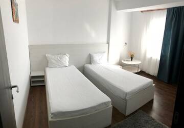 Фото номера Апартаменты с 3 спальнями Отель Hotel Nova Bital г. Popeşti-Leordeni 2