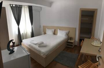 Фото номера Апартаменты с 3 спальнями Отель Hotel Nova Bital г. Popeşti-Leordeni 4