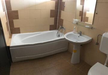 Фото номера Апартаменты с 2 спальнями Отель Hotel Nova Bital г. Popeşti-Leordeni 2